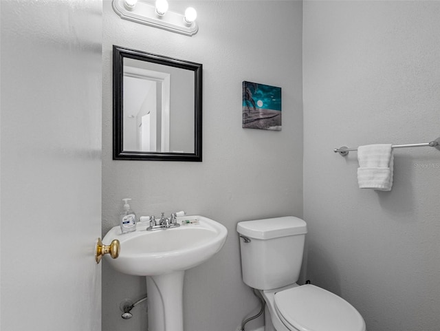 9109 134th Way, Seminole, FL 33776 - bathroom with toilet and a sink