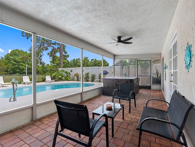 9109 134th Way, Seminole, FL 33776 - sunroom with a hot tub, ceiling fan, and french doors