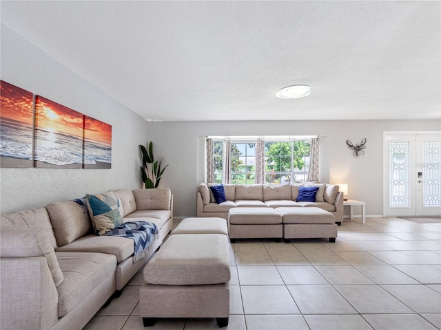 9109 134th Way, Seminole, FL 33776 - living area featuring light tile patterned flooring and french doors