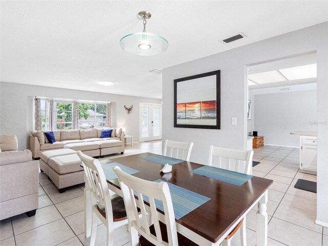 9109 134th Way, Seminole, FL 33776 - dining room with light tile patterned floors