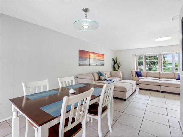 9109 134th Way, Seminole, FL 33776 - dining room featuring light tile patterned floors
