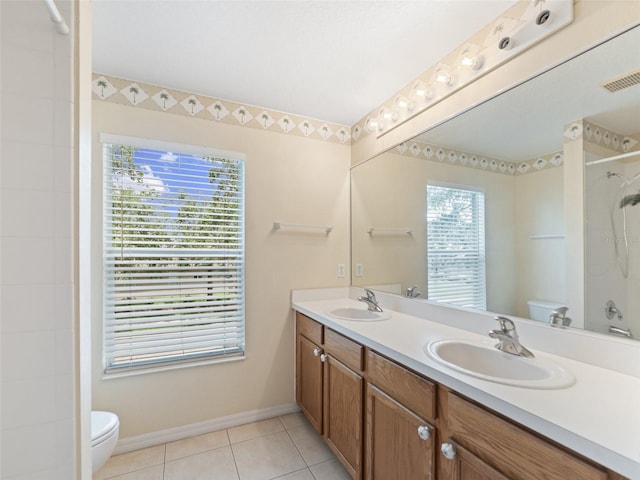 8222 Haven Harbour Way, Bradenton, FL 34212 - bathroom with a shower, double vanity, and tile patterned flooring
