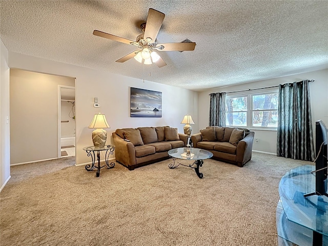 1102 Cara Dr, Largo, FL 33771 - carpeted living area featuring a ceiling fan and a textured ceiling