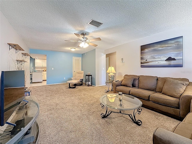 1102 Cara Dr, Largo, FL 33771 - carpeted living area with a textured ceiling and a ceiling fan