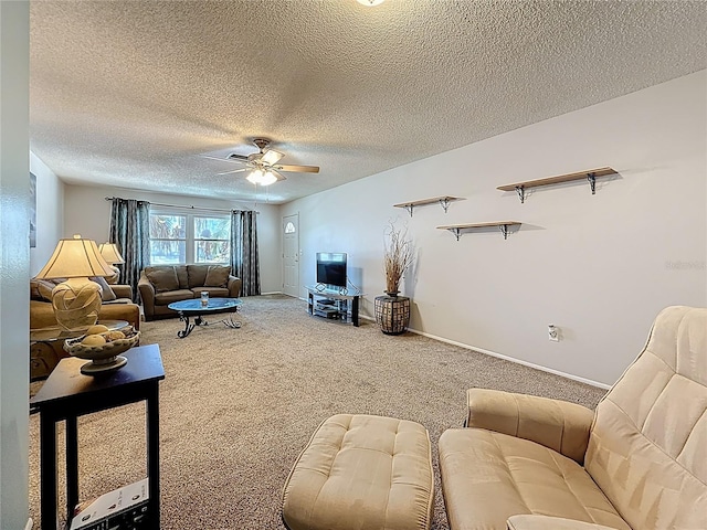 1102 Cara Dr, Largo, FL 33771 - living area with carpet, ceiling fan, and a textured ceiling