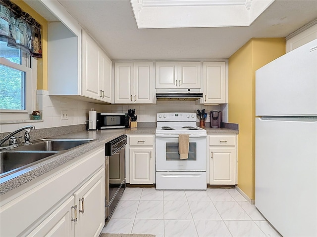 1102 Cara Dr, Largo, FL 33771 - kitchen featuring white appliances, ventilation hood, white cabinetry, and light marble finish floors