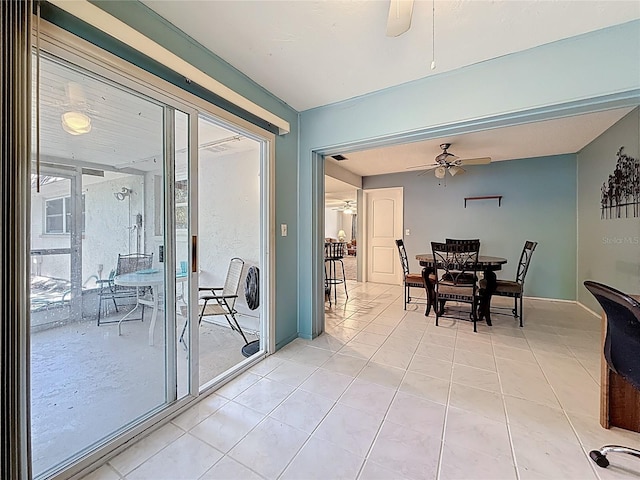 1102 Cara Dr, Largo, FL 33771 - dining area featuring ceiling fan and light tile patterned floors