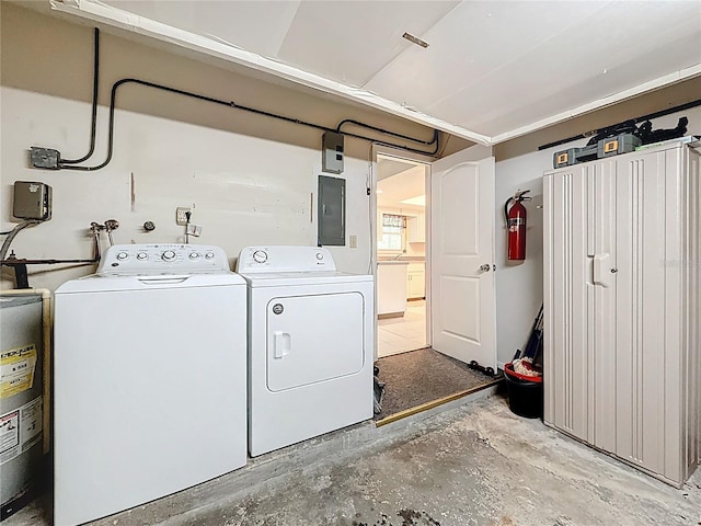 1102 Cara Dr, Largo, FL 33771 - washroom featuring gas water heater, electric panel, and washer and clothes dryer