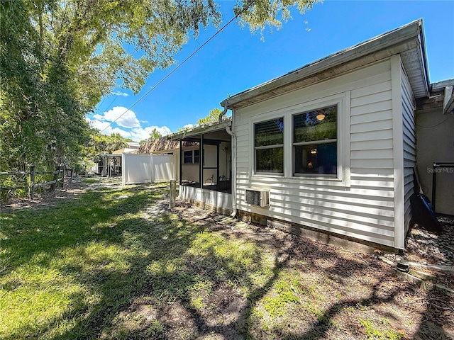 1102 Cara Dr, Largo, FL 33771 - view of home's exterior featuring a sunroom