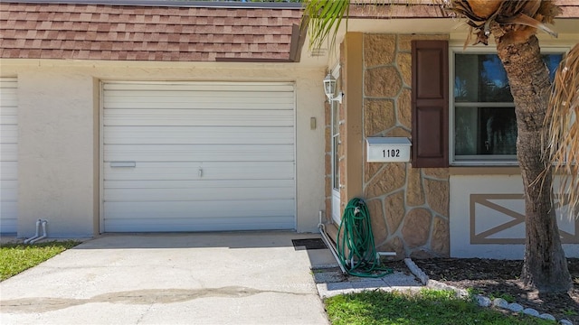 1102 Cara Dr, Largo, FL 33771 - garage featuring driveway