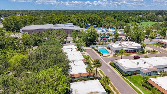 1102 Cara Dr, Largo, FL 33771 - drone / aerial view of a forest and a pool