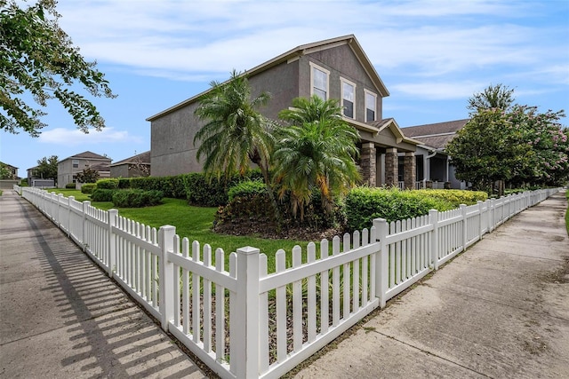 2706 Lantern Hill Ave, Brandon, FL 33511 - view of side of property featuring a fenced front yard
