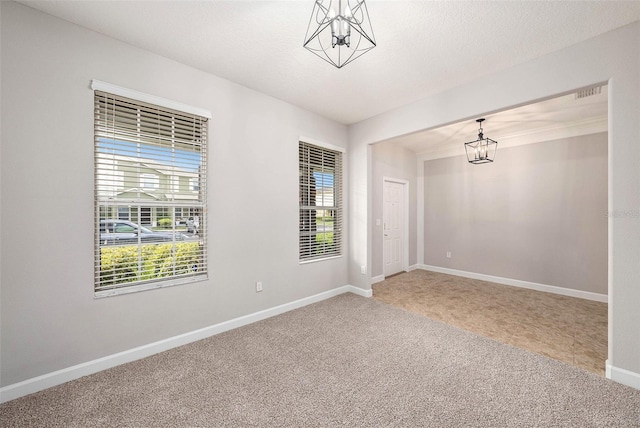 2706 Lantern Hill Ave, Brandon, FL 33511 - unfurnished room featuring a chandelier and carpet