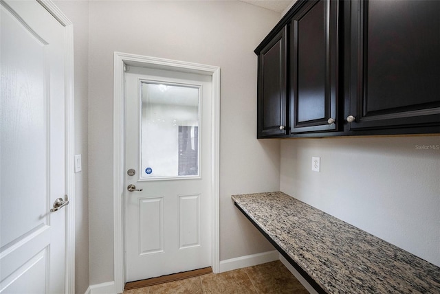 2706 Lantern Hill Ave, Brandon, FL 33511 - doorway with baseboards and light tile patterned floors