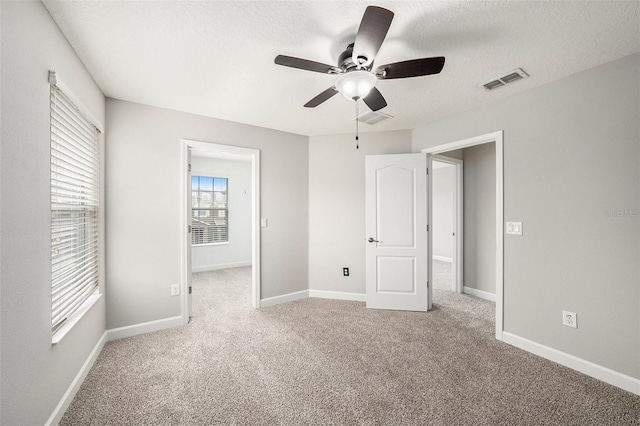 2706 Lantern Hill Ave, Brandon, FL 33511 - unfurnished bedroom featuring carpet floors, a textured ceiling, and ceiling fan