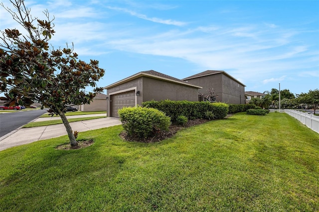 2706 Lantern Hill Ave, Brandon, FL 33511 - view of home's exterior featuring stucco siding, driveway, and an attached garage