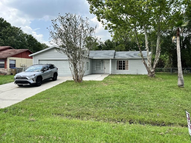 299 Cobalt Dr, Kissimmee, FL 34758 - single story home featuring driveway and an attached garage