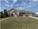 3926 N Eagle Pt, Crystal River, FL 34428 - view of front facade featuring a front yard