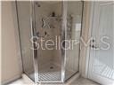 3926 N Eagle Pt, Crystal River, FL 34428 - bathroom featuring a shower stall