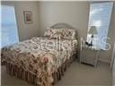3926 N Eagle Pt, Crystal River, FL 34428 - bedroom with multiple windows