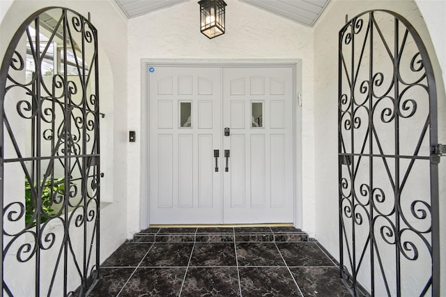 15722 Gardenside Ln, Tampa, FL 33624 - entryway with vaulted ceiling and a textured wall