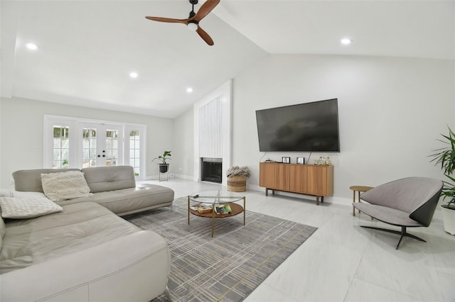 15722 Gardenside Ln, Tampa, FL 33624 - living area with ceiling fan, french doors, recessed lighting, high vaulted ceiling, and a large fireplace