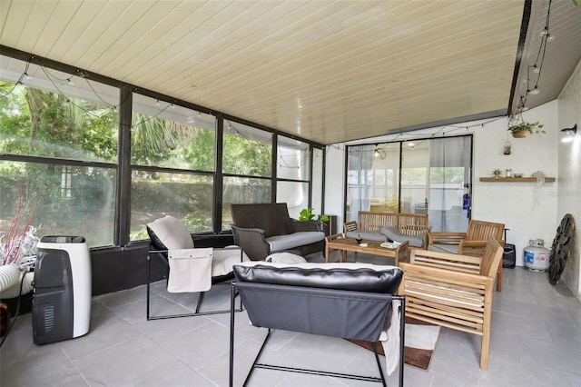 15722 Gardenside Ln, Tampa, FL 33624 - sunroom / solarium featuring an outdoor living space