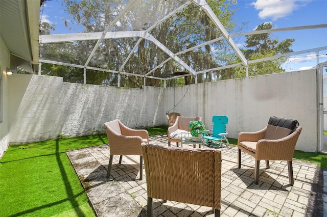 15722 Gardenside Ln, Tampa, FL 33624 - fenced backyard featuring a patio area and glass enclosure