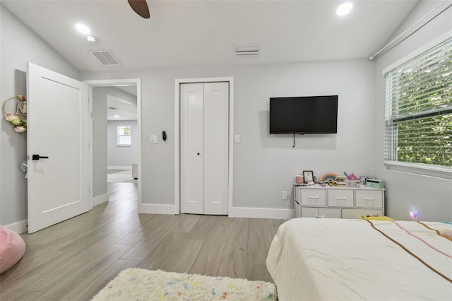 15722 Gardenside Ln, Tampa, FL 33624 - bedroom featuring wood finished floors, ceiling fan, and recessed lighting