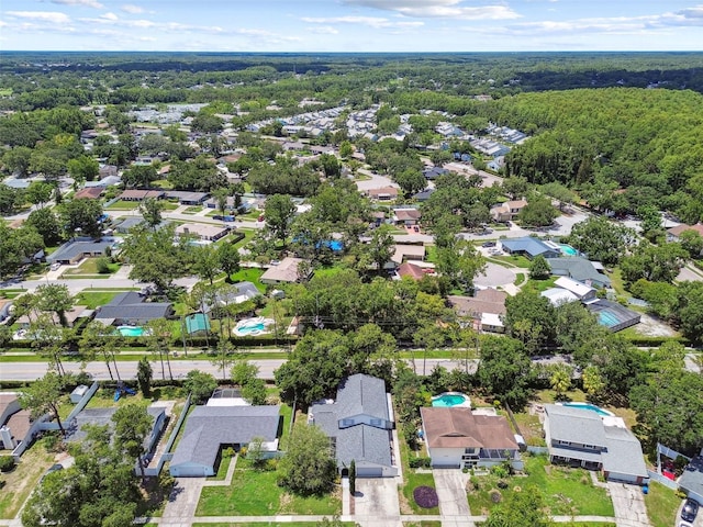 15722 Gardenside Ln, Tampa, FL 33624 - view of property location with nearby suburban area and a heavily wooded area