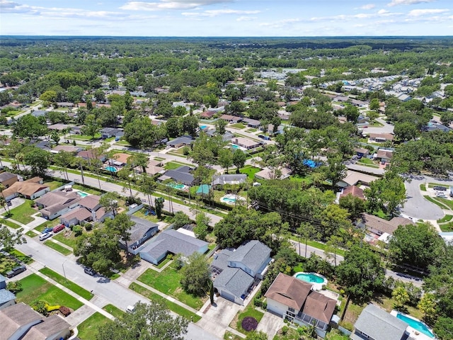 15722 Gardenside Ln, Tampa, FL 33624 - aerial view of property and surrounding area featuring nearby suburban area