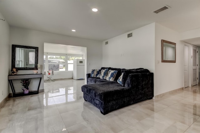 4727 Town N Country Blvd, Tampa, FL 33615 - living room with recessed lighting and baseboards