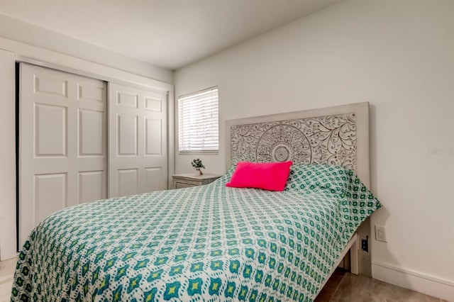 4727 Town N Country Blvd, Tampa, FL 33615 - bedroom featuring a closet and baseboards