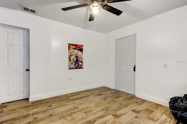 4727 Town N Country Blvd, Tampa, FL 33615 - empty room with ceiling fan and light wood finished floors