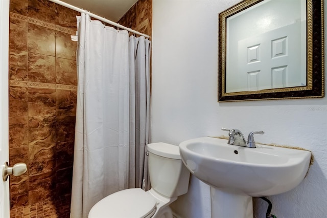 4727 Town N Country Blvd, Tampa, FL 33615 - bathroom with toilet and a tile shower