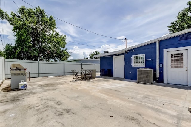 4727 Town N Country Blvd, Tampa, FL 33615 - view of patio / terrace featuring outdoor dining space and grilling area