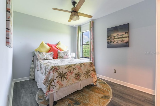 7683 Summerland Cv, Lakewood Ranch, FL 34202 - bedroom featuring wood finished floors and a ceiling fan