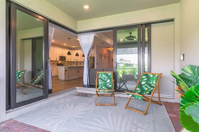 7683 Summerland Cv, Lakewood Ranch, FL 34202 - view of patio with a sink