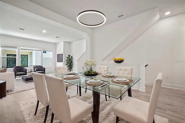 2511 N Grady Ave Unit 43, Tampa, FL 33607 - dining space featuring light wood-type flooring and recessed lighting