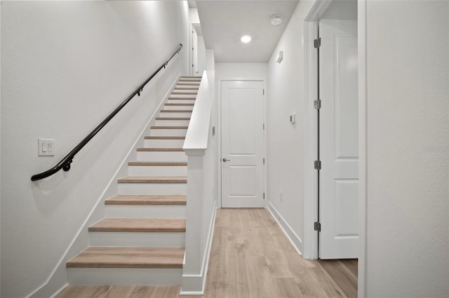 2511 N Grady Ave Unit 43, Tampa, FL 33607 - stairs featuring wood finished floors and baseboards