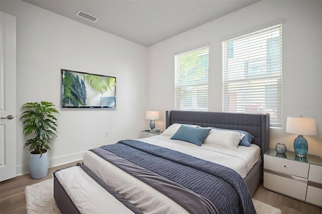 2511 N Grady Ave Unit 43, Tampa, FL 33607 - bedroom with wood finished floors and baseboards