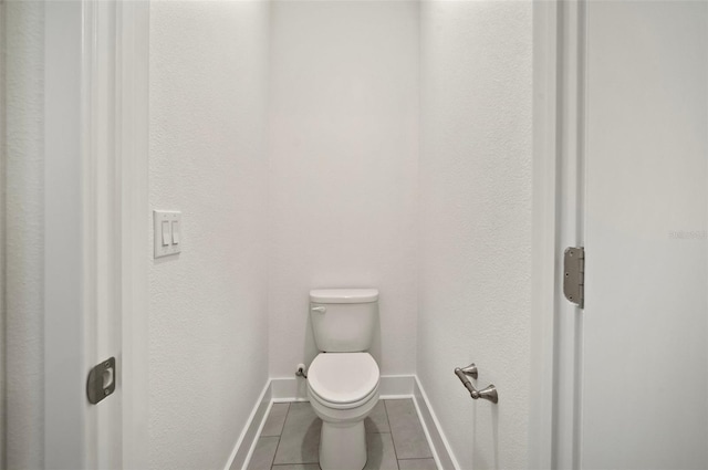 2511 N Grady Ave Unit 43, Tampa, FL 33607 - bathroom with tile patterned floors and baseboards