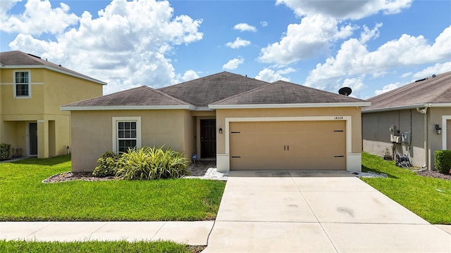 14524 Dunrobin Dr, Wimauma, FL 33598 - view of front of property with stucco siding, driveway, an attached garage, and a front yard