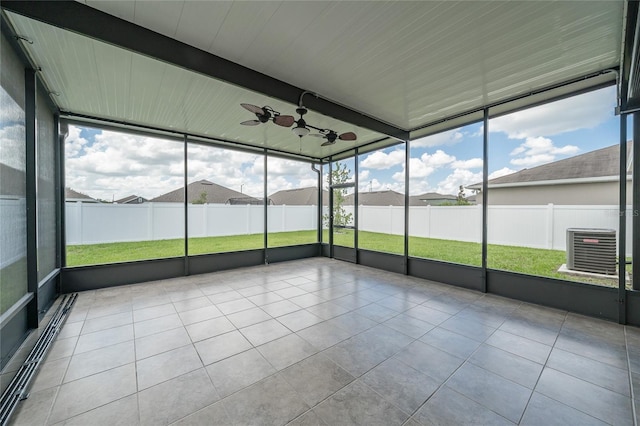 14524 Dunrobin Dr, Wimauma, FL 33598 - unfurnished sunroom featuring ceiling fan and beam ceiling
