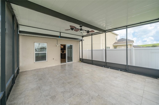14524 Dunrobin Dr, Wimauma, FL 33598 - unfurnished sunroom with healthy amount of natural light and a ceiling fan
