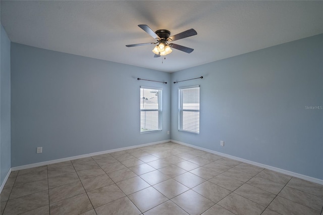 14524 Dunrobin Dr, Wimauma, FL 33598 - unfurnished room featuring a ceiling fan and tile patterned floors