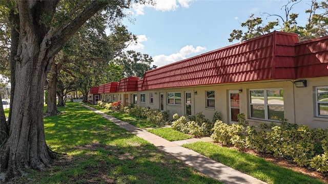 5870 38th Ave N Unit 44, Saint Petersburg, FL 33710 - view of property's community with a yard