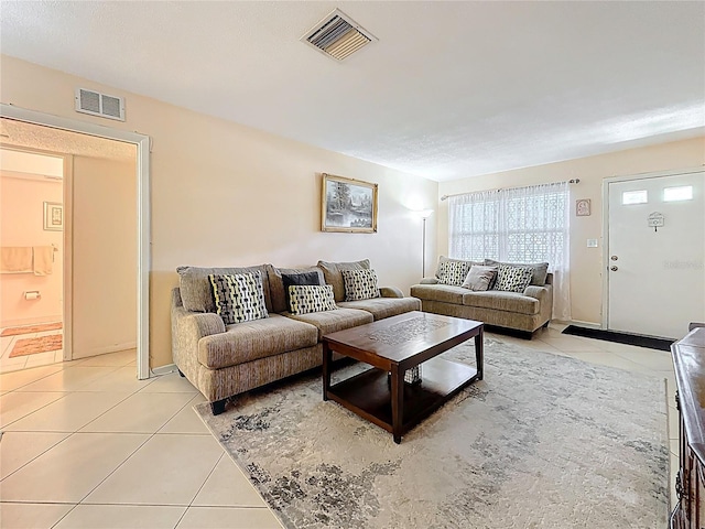 5870 38th Ave N Unit 44, Saint Petersburg, FL 33710 - living area featuring light tile patterned floors