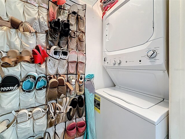 5870 38th Ave N Unit 44, Saint Petersburg, FL 33710 - laundry room with stacked washer / drying machine