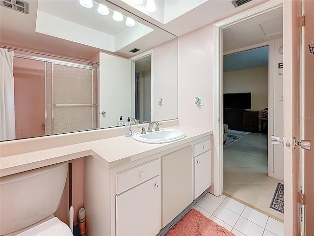 5870 38th Ave N Unit 44, Saint Petersburg, FL 33710 - full bath featuring vanity, tile patterned floors, and a shower with curtain